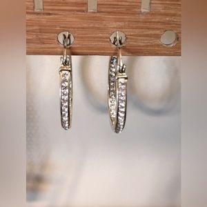 Faux diamond earrings that are hoops with secure closure, silver finish.